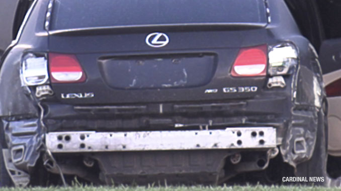 Black Lexus sedan with rear license plate missing from vehicle immediately after the crash and during the investigation of the crash at Biesterfield Road and Meacham Road on Tuesday, May 28, 2024 (CARDINAL NEWS)