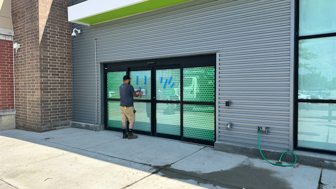 Employee Entrance signs applied to doors on the east side of the future Amazon Fresh store site on Monday, June 17, 2024 at 325 East Palatine Road in Arlington Heights (CARDINAL NEWS)