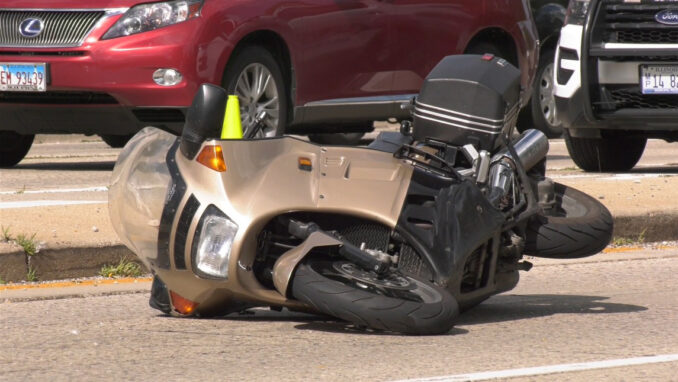 Motorcycle at crash scene at Lake Cook Road east of Wilke Road in Arlington Heights on Tuesday, June 18, 2024 (PHOTO CREDIT: Craig/CapturedNews)