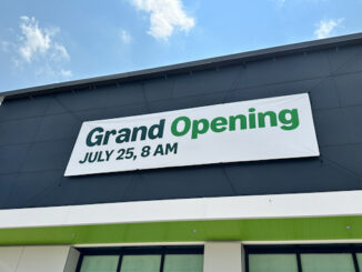 The third temporary banner at the Amazon Fresh Arlington Heights store announces a Grand Opening of July 25 at 8AM (CARDINAL NEWS)