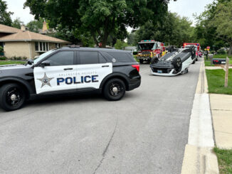 Police on scene of a rollover crash with injuries on Belmont Avenue near Magnolia Street in Arlington Heights on Tuesday, July 9, 2024 (CARDINAL NEWS)