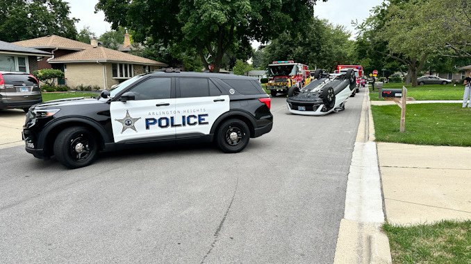 Police on scene of a rollover crash with injuries on Belmont Avenue near Magnolia Street in Arlington Heights on Tuesday, July 9, 2024 (CARDINAL NEWS)