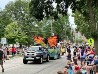 Watching a Monarch butterfly float from the Prospect Heights Natural Resources Commission, crowds were packed on both sides of Miner Street near the end of the parade route, which also included Dunton Avenue and Oakton Street -- also packed with viewers (CARDINAL NEWS)