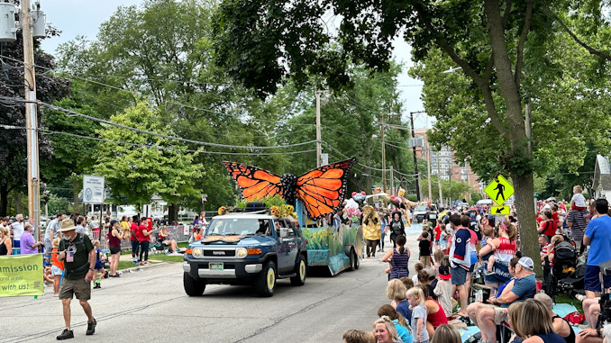 Watching a Monarch butterfly float from the Prospect Heights Natural Resources Commission, crowds were packed on both sides of Miner Street near the end of the parade route, which also included Dunton Avenue and Oakton Street -- also packed with viewers (CARDINAL NEWS)