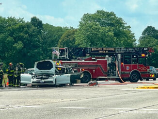 Rear-end crash with fire and one hurt in the eastbound lanes of Golf Road near Busse Woods (PHOTO CREDIT: Scott Jamieson)