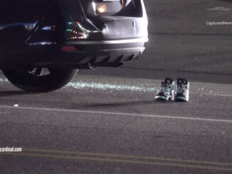 A Nissan Sentra, broken glass, and shoes at the scene of a fatal road rage shooting on Irving Park Road east of Mannheim Road in Schiller Park (CARDINAL NEWS)