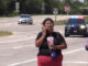 Suspect drinking a Big Gulp on the shoulder of Route 14 near the Speedway in Lake Barrington while police were arriving to search for her and the homicide suspect she had been accompanying Tuesday, August 20, 2024 (CARDINAL NEWS)