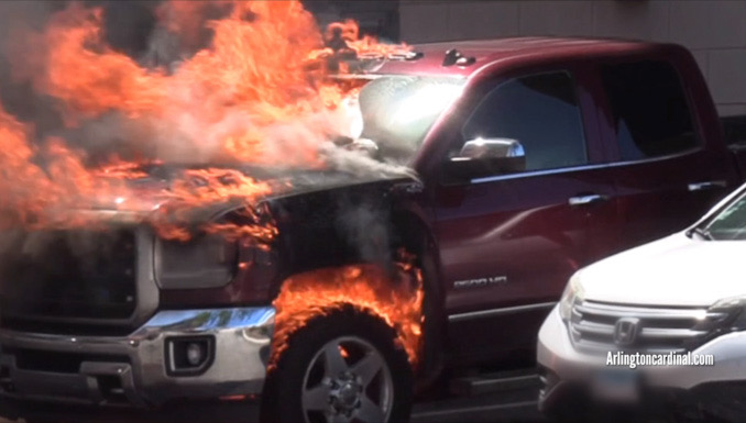 A GMC Sierra pickup truck burns on Labor Day weekend, Saturday, August 31, 2024 in Arlington Heights, Illinois (CARDINAL NEWS)