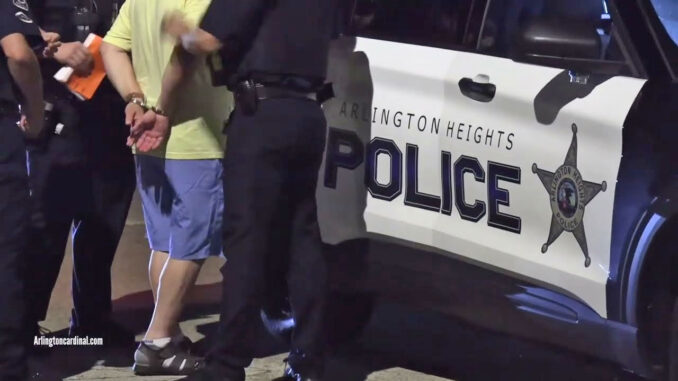 Arlington Heights Police Department police officer arrest a driver after he allegedly left the scene of a crash and apparently failed a field sobriety test on Saturday night, August 17, 2024 (CARDINAL NEWS)