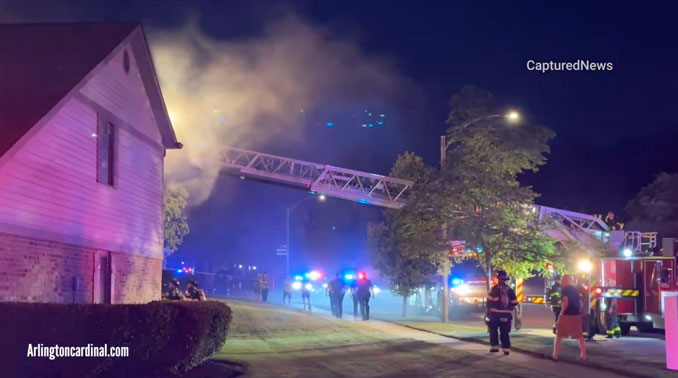 Arlington Heights Fire Department Tower 1 at the back and side of a townhouse kitchen fire incident on Pheasant Trail Lane in Arlington Heights, Wednesday, August 14, 2024 (CARDINAL NEWS)