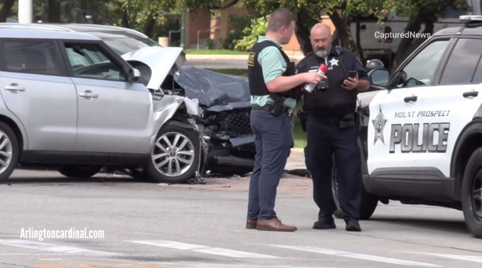 Investigation at the scene of a crash where a woman suffered cardiac arrest at 
 Rand Road and Euclid Avenue in Mount Prospect near Arlington Heights, Illinois (CARDINAL NEWS)