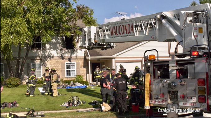 Wauconda Tower Ladder at the scene of a townhouse fire on Wethington Drive in Wauconda on Monday, August 12, 2024 (Craig/CapturedNews)