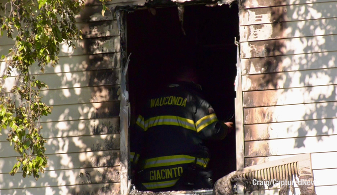 Firefighter inside on the second floor at the scene of a townhouse fire on Wethington Drive in Wauconda on Monday, August 12, 2024 (Craig/CapturedNews)