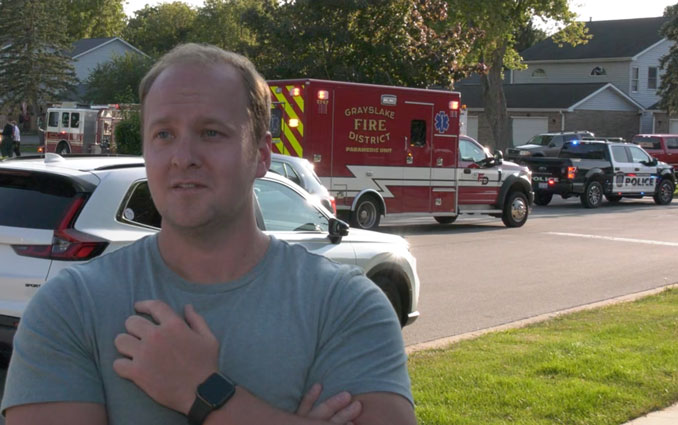 Steve Solimini explains how he rescued residents from two townhouse units while flames were showing from a second floor window, and inside from a door in a hallway at a fire scene on Wethington Drive in Wauconda, Monday, August 12, 2024 (Craig/CapturedNews)