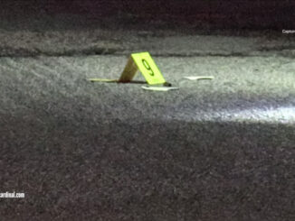 Evidence marker next to a shell casing after two were shot outside at an apartment complex in the block of 1700 Chariot Court in Mount Prospect, Friday, September 6, 2024 (CARDINAL NEWS)