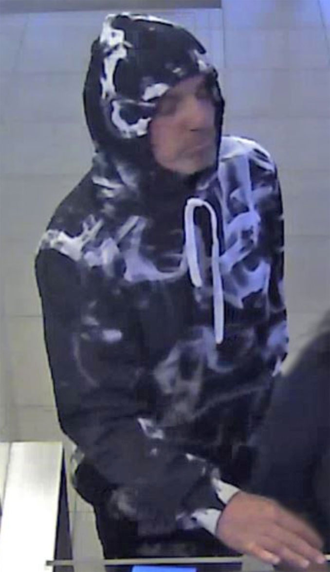 Bank robber suspect at counter at Citibank, 180 North Michigan Avenue, Chicago, on Monday, September 16, 2024 (SOURCE: FBI)