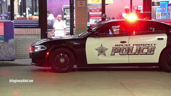 Mount Prospect police car at the BP gas station at the southwest corner of Dempster Street and Elmhurst Road in Mount Prospect after a shooting near the RecPlex fitness center, Sunday, September 1, 2024 (CARDINAL NEWS)