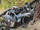 A 40 MPH Speed Limit sign visible in the background of a photo of the burnt wreckage of a black Dodge Challenger that was involved in a crash on Davis Road near southwest Woodstock in western Dorr Township in McHenry County (SOURCE: Woodstock Fire/Rescue District)