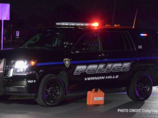 Vernon Hills police SUV with an orange defibrillator/monitor case near the driver's door at a fatal vehicle vs pedestrian crash on Friday night, October 18, 2024 (PHOTO CREDIT: Craig/CapturedNews)