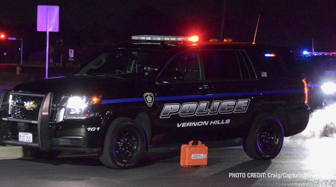 Vernon Hills police SUV with an orange defibrillator/monitor case near the driver's door at a fatal vehicle vs pedestrian crash on Friday night, October 18, 2024 (PHOTO CREDIT: Craig/CapturedNews)