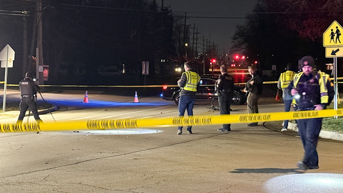 Rolling Meadows police officers and MCAT-STAR investigators working at the scene of a fatal car vs bicycle crash at Campbell Street and Rohlwing Road in Rolling Meadows Tuesday night December 17, 2024 (CARDINAL NEWS)