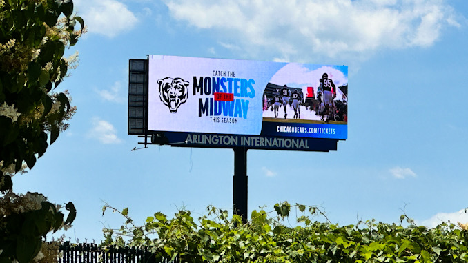 A Chicago Bears Monsters of the Midway billboard towers over Route 53 on the Chicago Bears Football Club property just east of the Route 53 expressway (CARDINAL NEWS)