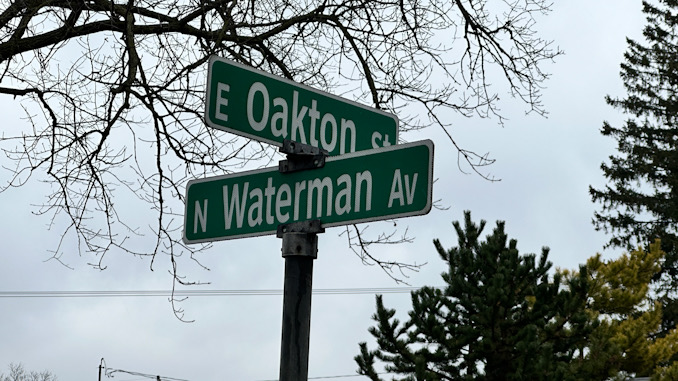 Oakton Street and Waterman Avenue intersection just north of the Rolling Country Club golf course treeline (CARDINAL NEWS)