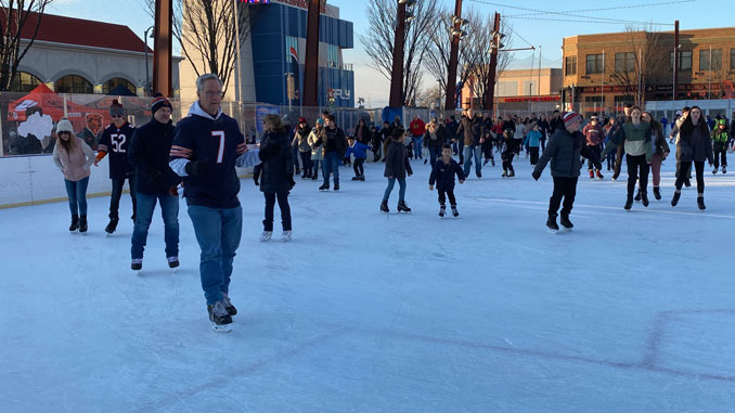 Chicago Bears Chairman George McCaskey (#7) leads ice skaters around the rink at Rosemont's entertainment district ice rink at a Chicago Bears event on February 16, 2020 (CARDINAL NEWS)