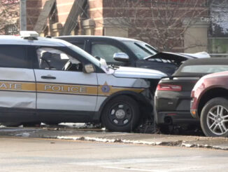 Illinois State Police vehicle sideswiped by black Toyota Tacoma (PHOTO CREDIT: CapturedNews)