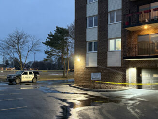 Crime scene tape near the West Garage entrance at Meadows Condominiums, 1200 West Northwest Highway in Mount Prospect, Monday, February 24, 2025 (CARDINAL NEWS)